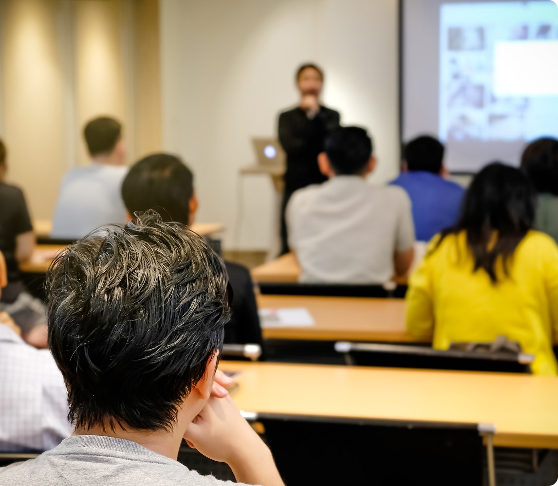 classroom with students and speaker